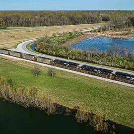 Norfolk Southern with a loaded coal train for Duke Energy at East Mount Carmel Indiana by Jim Pearson