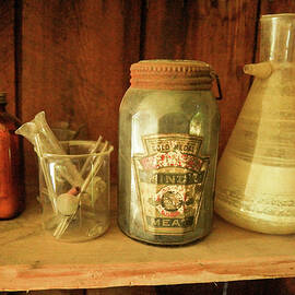 Old bottles and things  by Jeff Swan