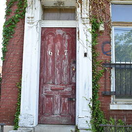 Old door at 617 by Patrick Baehl de Lescure