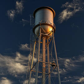 Oregon WI Tin-Man Water Tower glowing in setting sunlight - vertical format option by Peter Herman