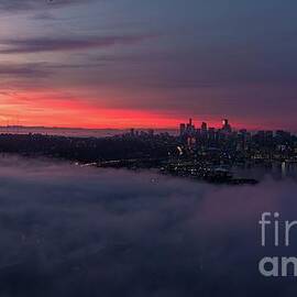 Over Seattle On A Cloud Sunrise by Mike Reid