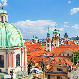 Prague old town rooftops by Neale And Judith Clark