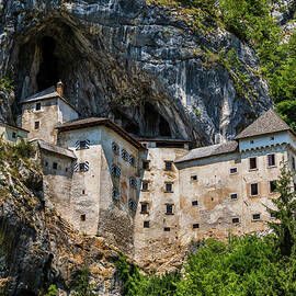 Predjama Castle in Slovenia by Artur Bogacki