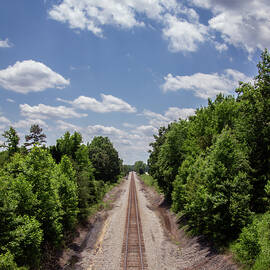 Railroad Tracks Vanishing Point   by Robby Batte