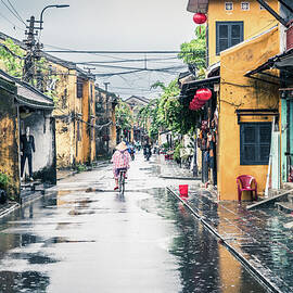 Rainy day in the Old Town of Hoi An by Alexey Stiop