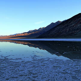 Reflections In Badwater Basin, Death Valley by Glenn McCarthy