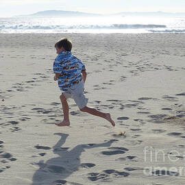 Running on the Beach by Connie Sloan