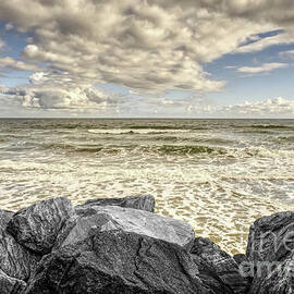 Selective colour of the rocky seafront in Whitby UK. by Pics By Tony