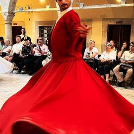 Solo Whirling Dervish Dancer. Istanbul, Turkyie by Courtney Dagan