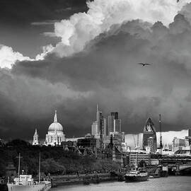 Stormy skies over the London skyline by Justin Foulkes
