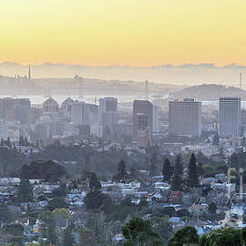 Sunset over Oakland and San Francisco Hazy Skylines by Yuval Helfman
