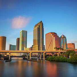 Tampa skyline at sunset with Hillsborough river in the foreground by Miroslav Liska