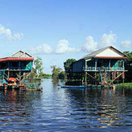 Tonlesap lake cambodia floating village 2 by Sonny Ryse