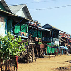 Tonlesap lake cambodia floating village chong khneas by Sonny Ryse