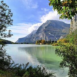 Tranquil beauty of an alpine lake by Lucia Waterson