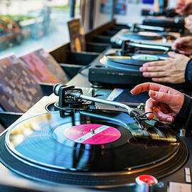 Turntables Spinning Vinyl Records by Andreea Eva Herczegh