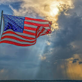 US Flag during Storm Approach by Steve Rich