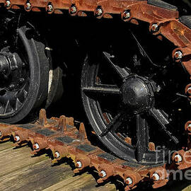 Wheels within rubber-faced track of British Army amphibious military bulldozer by Terence Kerr