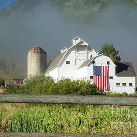 White Barn - American Flag - Foggy Utah by Brian Jannsen