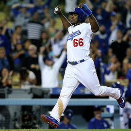 Yasiel Puig and Howie Kendrick by Stephen Dunn