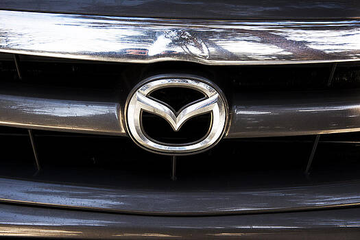 Newnow Photography By Vera Cepic - Closeup of Mazda car trademark Newnow Photography By Vera Cepic - Closeup of Mazda car trademark
