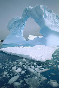 Colin Monteath - Arched Iceberg Antarctica Colin Monteath - Arched Iceberg Antarctica