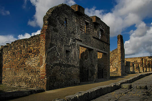 Enrico Pelos - Pompei una delle strade lastricate Paved road with building facade Enrico Pelos - Pompei una delle strade lastricate Paved road with building facade