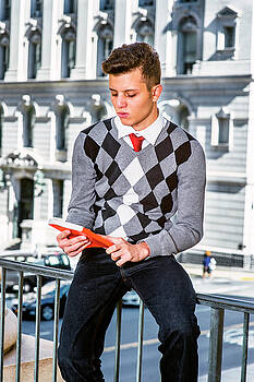 Alexander Image - Young American Man Reading Outside in New York Alexander Image - Young American Man Reading Outside in New York