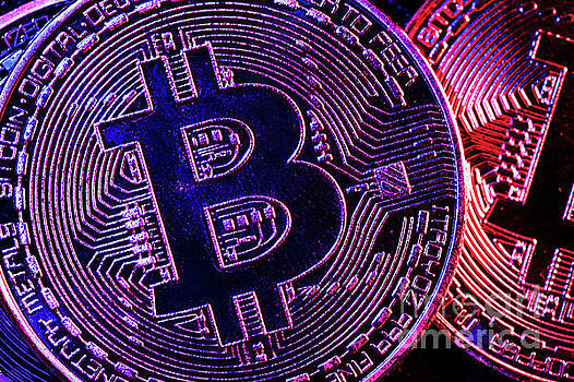 Michal Bednarek - Bitcoin coins in a mysterious lighting Michal Bednarek - Bitcoin coins in a mysterious lighting