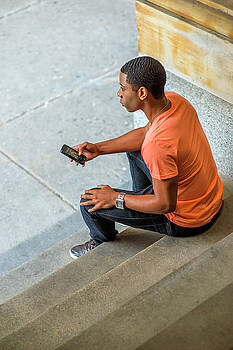 Alexander Image - Black Boy Texting Outside Alexander Image - Black Boy Texting Outside