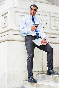 Alexander Image - Young businessman texting outside 17051415 Alexander Image - Young businessman texting outside 17051415