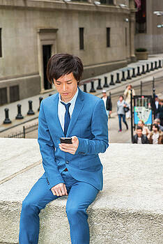 Alexander Image - Young Japanese Man texting on street 1504145 Alexander Image - Young Japanese Man texting on street 1504145