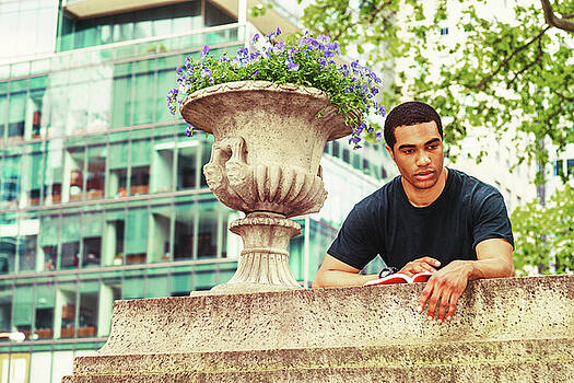 Alexander Image - Young man reading book outside 17051420 Alexander Image - Young man reading book outside 17051420
