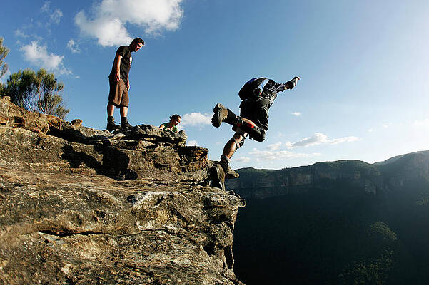 Wall Art - Photograph - A Base Jumper Performs A Front Flip #1 by Krystle Wright