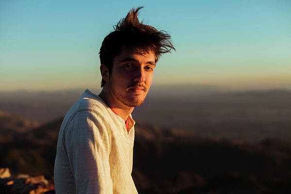 Wall Art - Photograph - A Man Enjoying The Sunset #1 by Ryan Tuttle