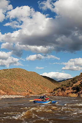 Wall Art - Photograph - A Whitewater Rafters Rows His Boat #1 by Kyle George
