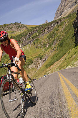 Wall Art - Photograph - Cyclists Climb A Hill With A Mountain #1 by Heath Korvola