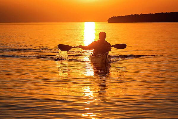 Wall Art - Photograph - Kayaking At Sunset In The Apostle #1 by Chuck Haney