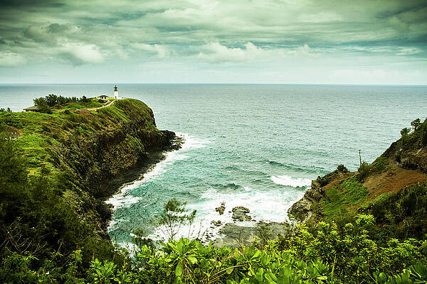 Wall Art - Photograph - Lighthouse At The Edge Of A Rock #1 by Tim Martin