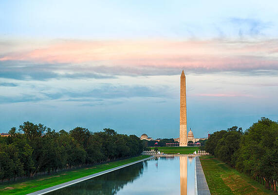 Wall Art - Photograph - Setting sun on Washington monument reflecting #1 by Steven Heap