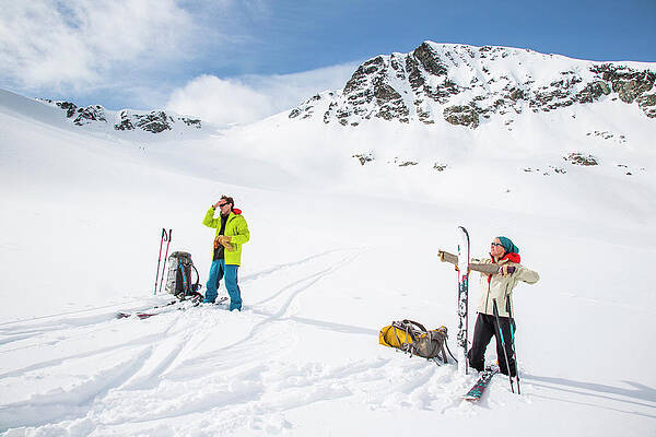 Wall Art - Photograph - Skiers At The Top Of A Pass With A Wide #1 by Michael Hanson