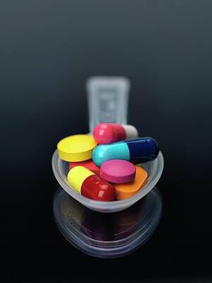 Wall Art - Photograph - Spoonful Of Medicine by Tek Image/science Photo Library