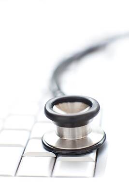 Wall Art - Photograph - Stethoscope And Keyboard #1 by Science Photo Library