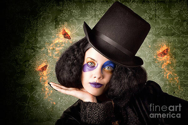 Wall Art - Photograph - Stylish female magician performing magic trick by Jorgo Photography