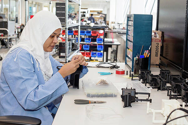 Wall Art - Photograph - Uav Factory Construction Worker #1 by Science Photo Library