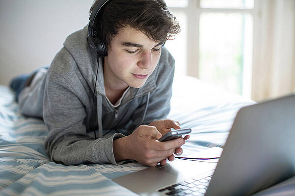 Wall Art - Photograph - Young Man Using Smartphone #1 by Science Photo Library