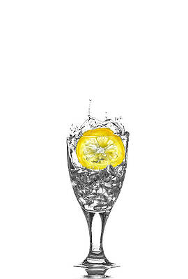 Wall Art - Photograph - Slice of lemon in Glass #13 by Peter Lakomy