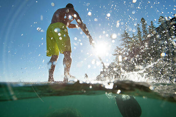 Wall Art - Photograph - A Man Stand-up Paddle Boarding In Lake #2 by Corey Rich