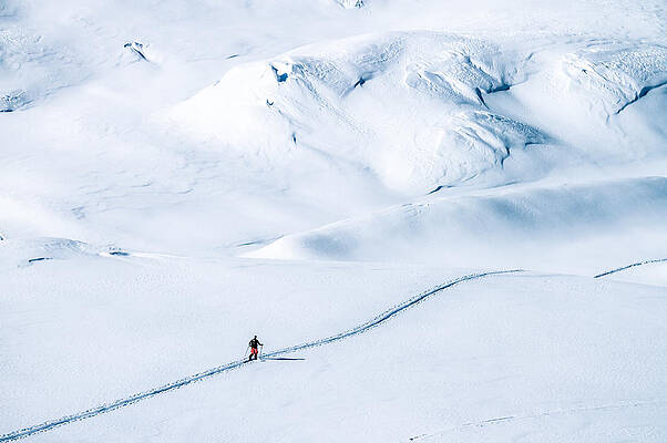 ski tourer on big mountains in a winterlandscape by Leander Nardin ski tourer on big mountains in a winterlandscape by Leander Nardin