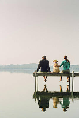 Wall Art - Photograph - Woman, Dog And Man Relaxing On The End #2 by Corey Hendrickson